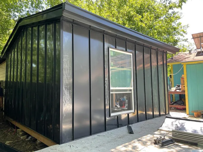 Black standing seam metal wall panels for Metal Roof Installation in North Castle